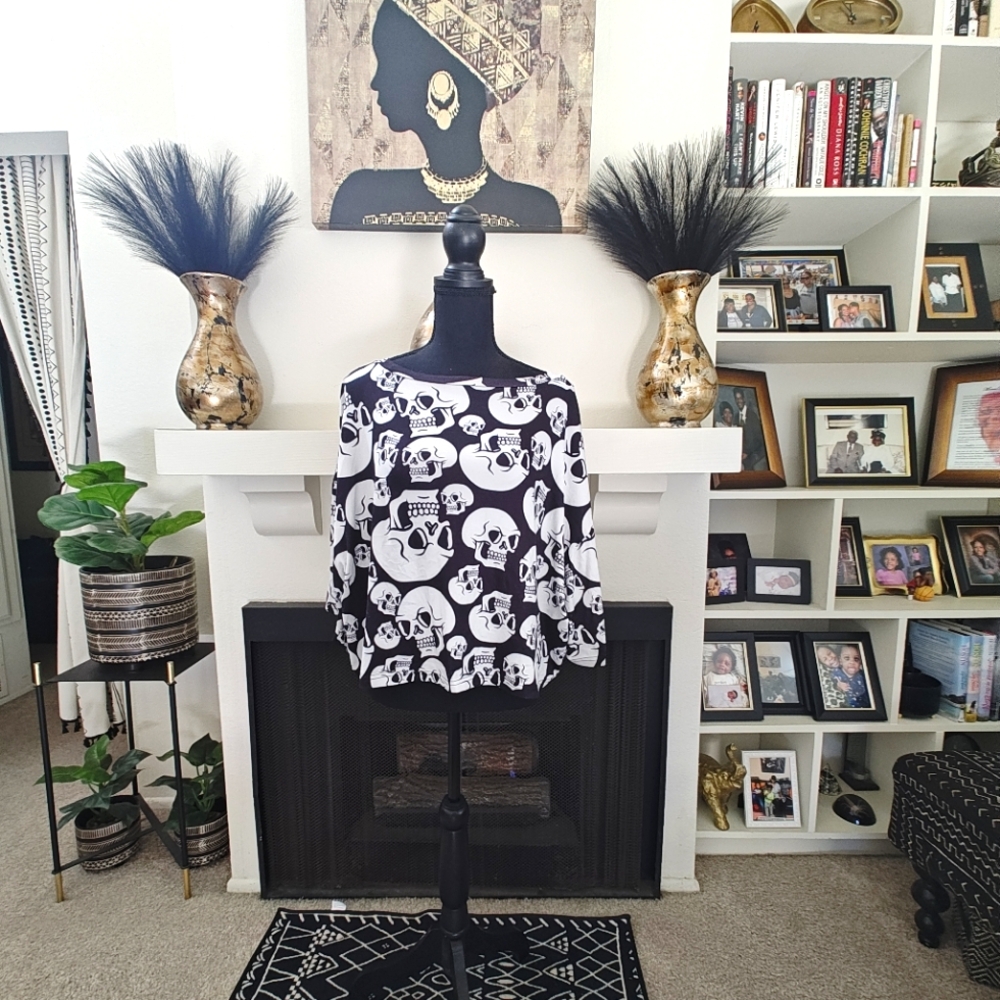 I'm selling a black and white skull night top